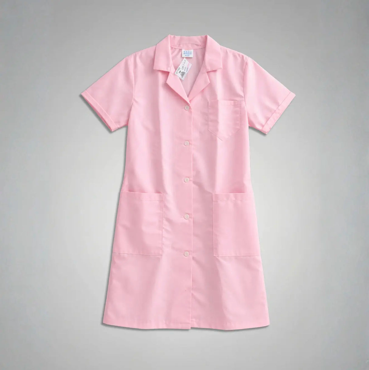Pink ladies smock on a gray background