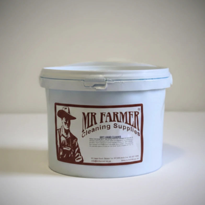 White bucket with 'Mr Farmer Cleaning Supplies' label on a light background